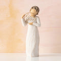 Willow Tree Love you, 5.5”h hand-painted standing figure in cream dress, holding gold wire circle with 'love you' inside, in front of peach painting