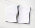 Inside view: inside spread of notebook, showing lined text-weight pages