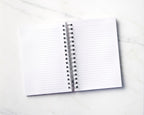 Inside view: inside spread of notebook, showing lined text-weight pages