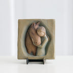 Small tan rectangle plaque with carved in horse and girl figurines