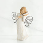 Blonde faceless girl holding white shell to her ear wearing white dress and black wire angel wings