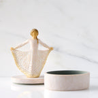Front view: open oval resin box, showing detached lid with figure next to box base