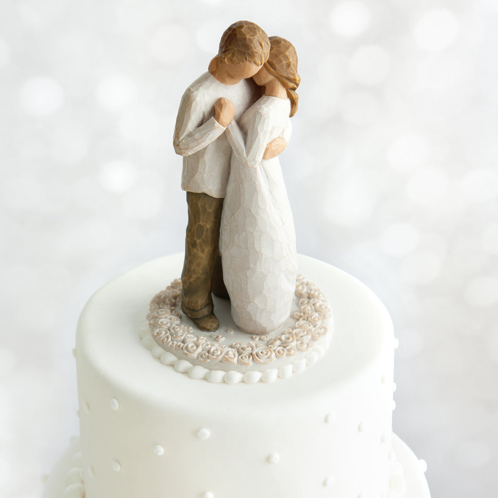 Willow Tree Promise Cake Topper, 6”h hand-painted resin figure of standing couple embracing or dancing, both in neutral colors, affixed to 3.5" diameter food-safe base carved with white roses